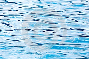 The smooth water in the pool as a background