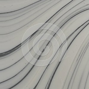 Smooth, wavy texture with parallel dark lines flowing across a light gray surface,
