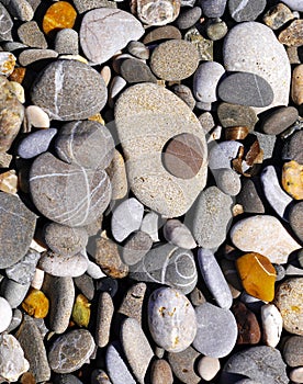 Smoothed pebbles on the beach by the Sea