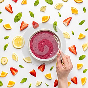 Smoothie bowl in layout of fruit