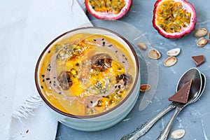 Smoothie bowl with mango and passion fruit