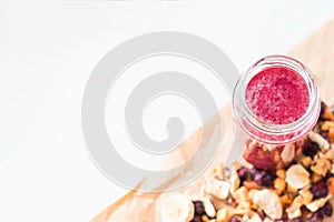 Smoothie of freeze-dried cherry, banana, apple, blueberry in a highball glass photo