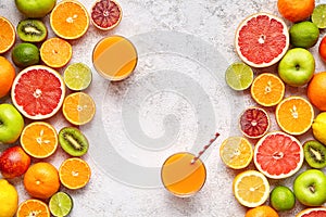 Smoothie or fresh juice vitamin in citrus fruits background flat lay, helthy natural beverage