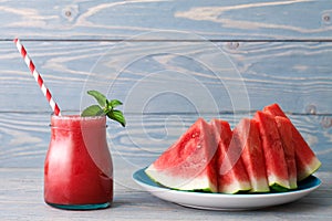 Smoothie and a plate of water melon pieces