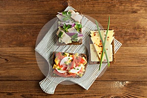 Smorrebrod - danish open sandwich with fish, herring, cheese photo
