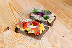 Smorrebrod - danish open sandwich with fish, herring