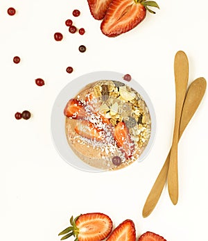 Smothie with fresh strawberry and granola on white background