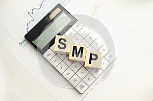 SMp Social Media Platform concept. Wood block sphere shape on computer keyboard with word SEO and empty copy space for your text