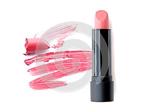 Smudged pink lipstick isolated on white background.