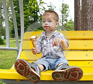 Smudgy funny boy eating ice-cream