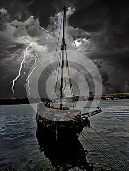 Smugglers Sloop in a storm on a devon River