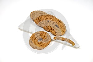 Snack Chakli, a spiral shaped crisp deep fried snack, It is known as Chakali, Murukku,