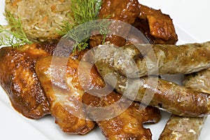 Snack - chicken wings, sausages, pork ribs