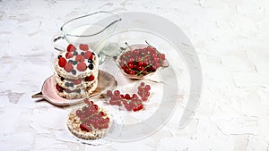 Snack with crispbread, cream cheese and fresh fruits on white background. Healthy food concept. Flat lay, top view