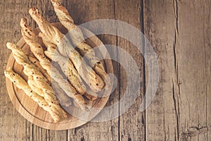 Snack of Grissini Bread Sticks on a Wooden Background Tapas Bar Homemade Bread Sticks Horizontal Top View Flat Layout Copy Space