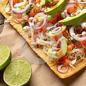 Snack made with wheat flour called chicharron preparado with sauce and vegetables. Mexican food photo