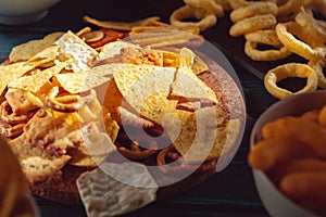 Snack mix. Salty treat for snacking. Dark background