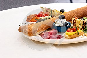 snack platter with bread, dips appetizer