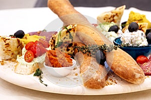 snack platter with bread, dips appetizer