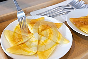 Snack set, pancakes with honey topped with serving tray