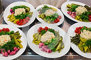 Snacks of marinated vegetables on a