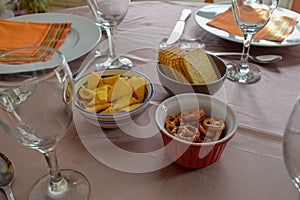 Snacks and Wine Glasses on Beautifully Served Table - Family Meal