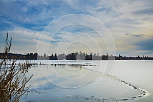 Snagov lake during wintertime.Cloudy day.Gorgeous landscape.Frost on the surface