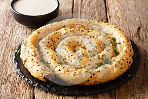 Snail pie borek burek from filo pastry with feta cheese closeup. horizontal