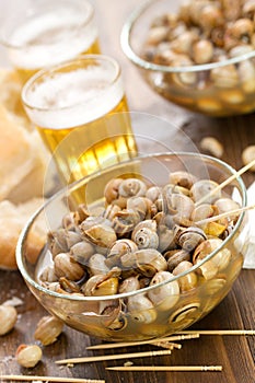 Snails in dish on brown