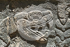 Snake carved relief detail symbol in Chichen Itza ruins