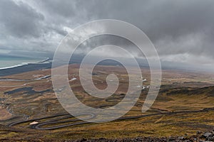 Snake Road in Iceland. Landscape. Cloudy Blue Sky