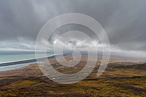Snake Road in Iceland. Landscape. Cloudy Blue Sky. Wide Angle. Ocean.