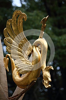 Snake winged figure