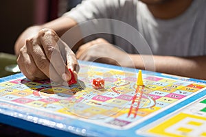 Snakes and ladders board game