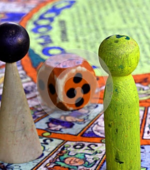 Snakes and ladders with giant nut