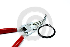 Snap-ring pliers with a ring