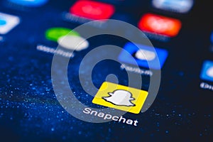 Snapchat app icon on the screen smartphone