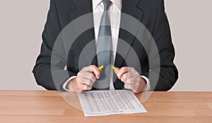 Snapped - man at desk with broken pencil, stress