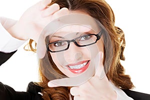 Snapshot of business woman in eyeglasses.