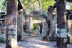 Snapshot illustrating the decaying edifice of a medieval stone construction in Cambodia