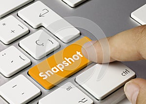 Snapshot - Inscription on Orange Keyboard Key