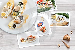 Snapshots of various sandwiches with seafood arranged on rustic wooden background with plates with food and seashells