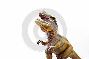Snarling green Tyrannosaurus a huge reptile from the Jurassic period, a children`s toy.