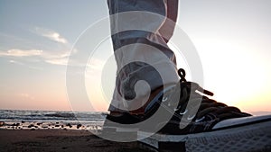 Sneakers beach and sunset