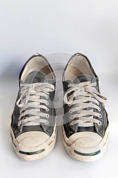 Sneakers dirty isolated on white background, Footwear for outdoor activities