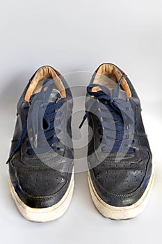 Sneakers dirty isolated on white background, Footwear for outdoor activities