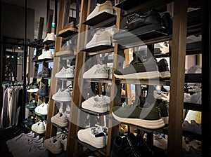 Sneakers on a modern fashion store shelves