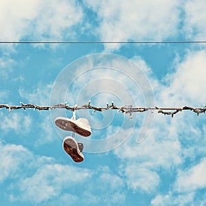 Sneakers on the power line, beauty filter