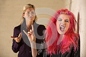 Sneering Parent and Loud Daughter photo