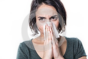 Sneeze girl having flu on white studo background photo